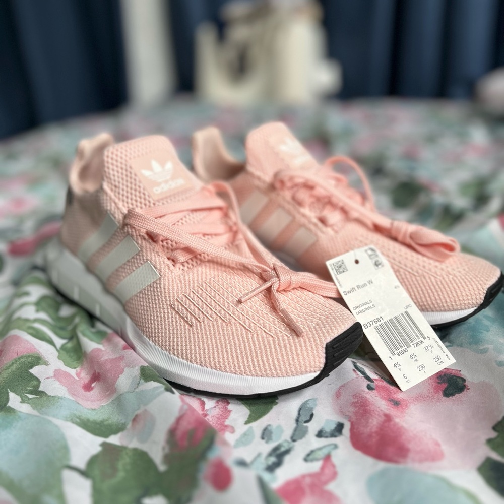 Women’s pink adidas swift run